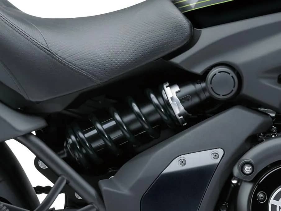 Linkage-equipped offset laydown single-shock