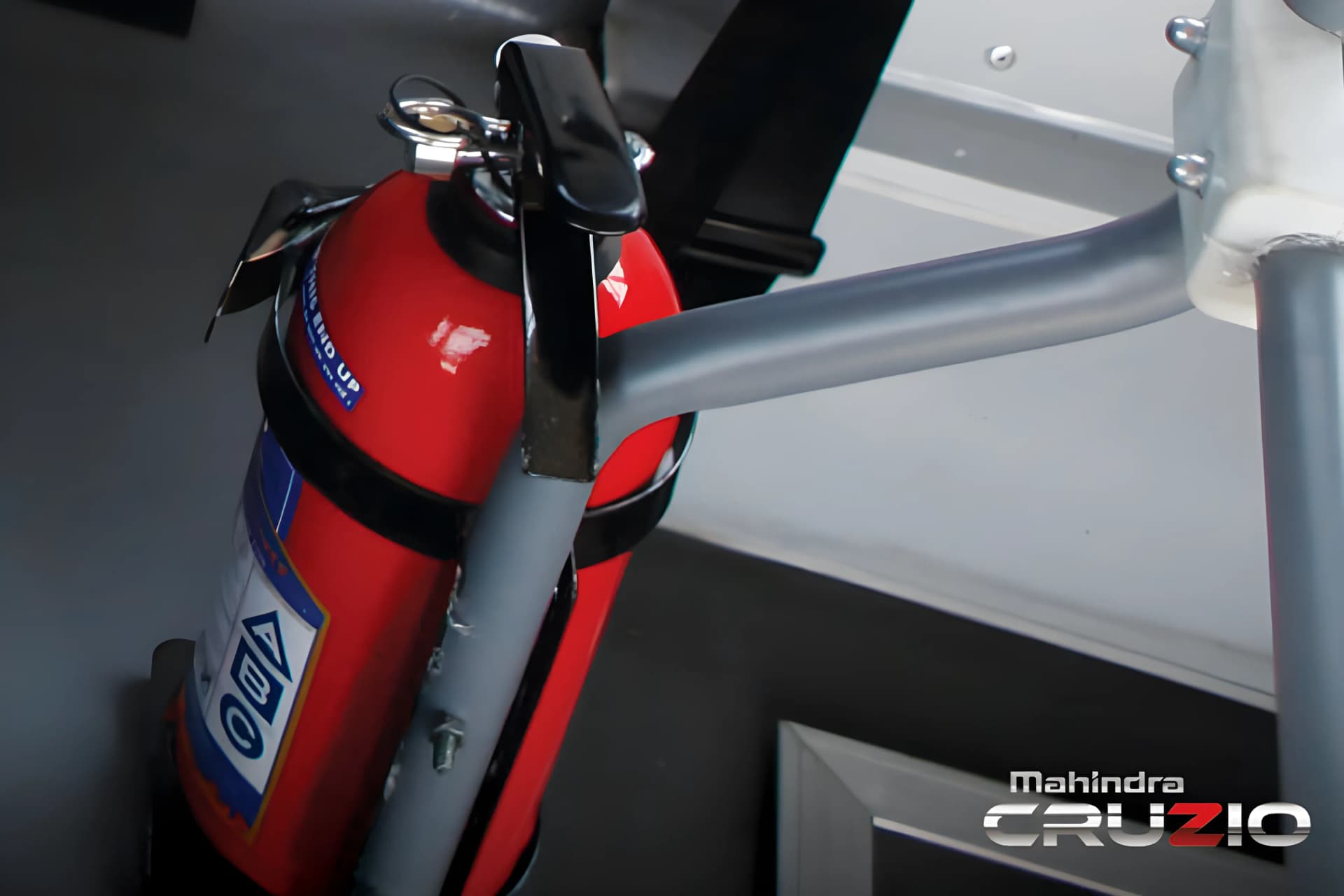 Mahindra Cruzio School Fire Extinguisher View